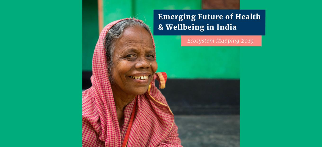 An elderly Indian woman in a red robe smiles in front of a building painted in green. The sides of the photo are flanked with green borders. Text in a blue box reads Emerging Future of Health & Wellbeing in India. Below the blue box is a pink box with text that reads Ecosystem Mapping 2019