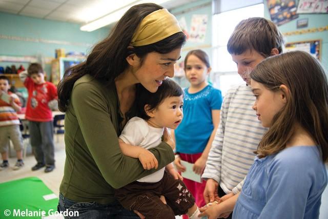 Parent-child pairs visiting a Roots of Empathy classrooms